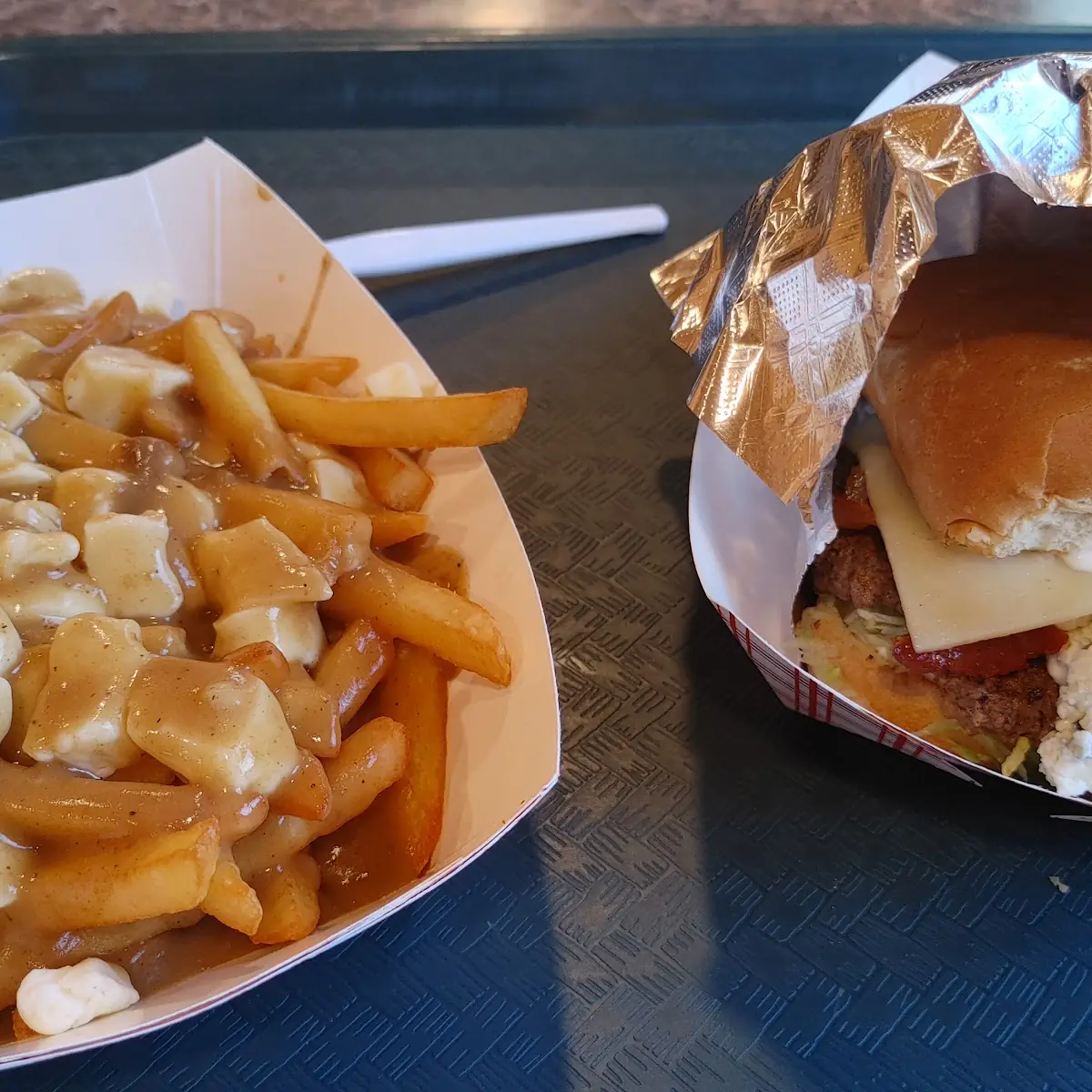 Poutine and a Black and Bleu Cheese Burger Deluxe