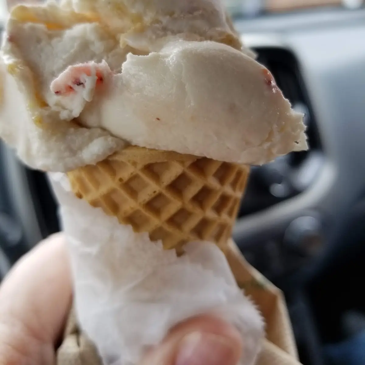 Strawberry Cheesecake Ice Cream on a Waffle Cone