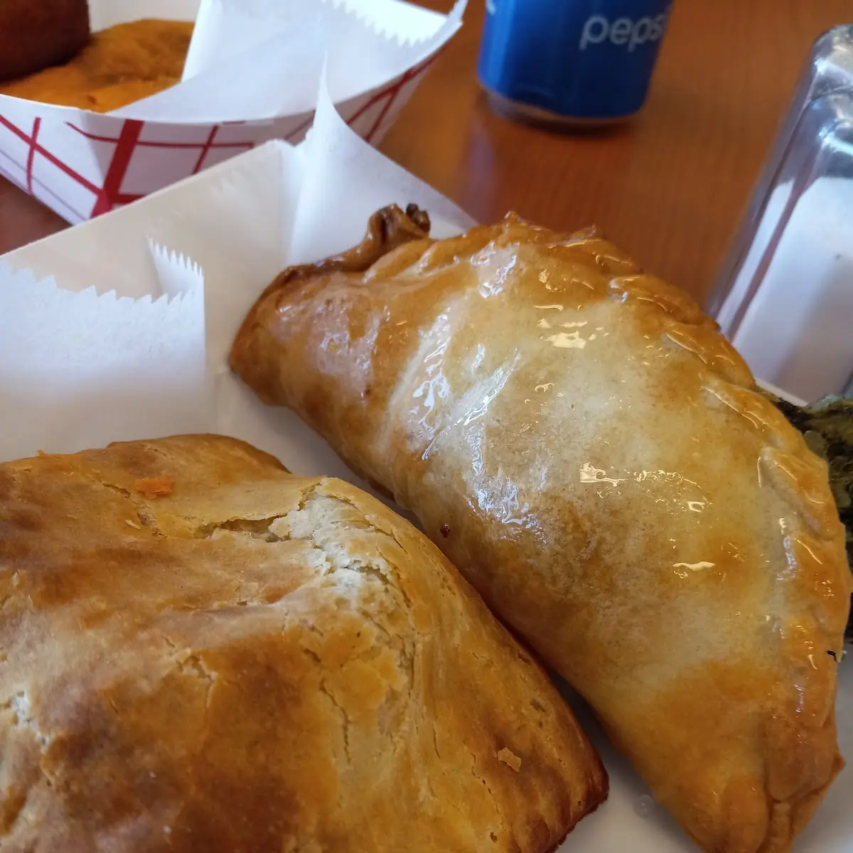 Spinach Empanada and Jerk Chicken Pocket