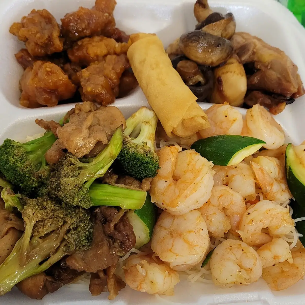 Broccoli Chicken Shrimp Sesame Chicken Spring Roll and Sautéed Mushrooms