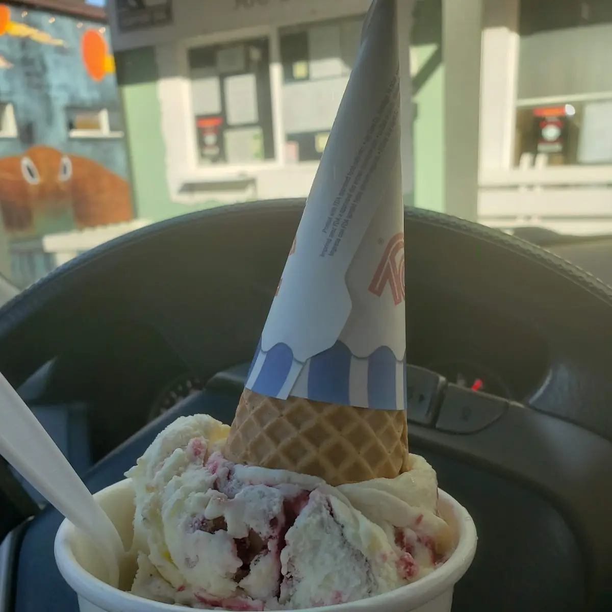 Lemon Cheesecake Raspberry Swirl Ice Cream Cone