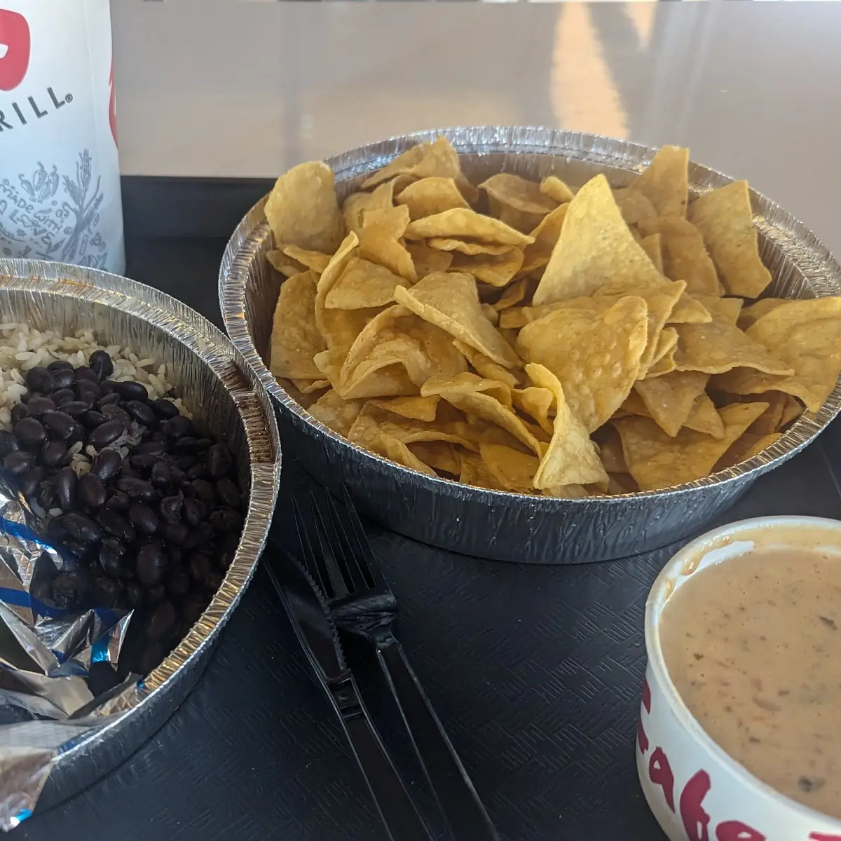 Tacos Rice Beans Queso and Chips