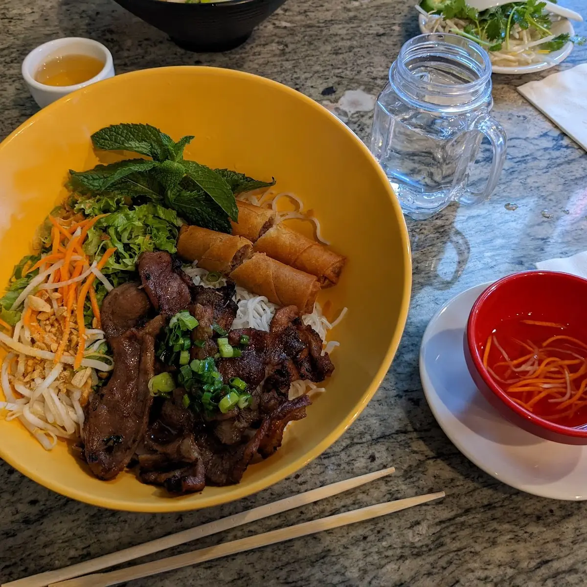 Rice Noodles with Roast Pork and Egg Rolls