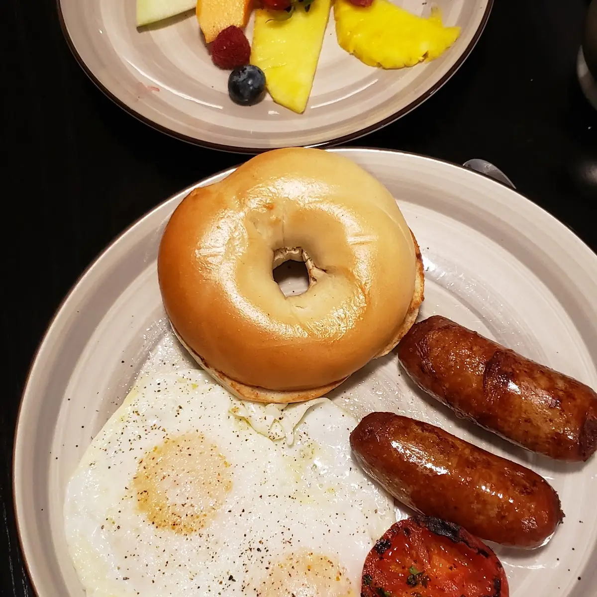 Two Eggs over Easy Sausage and Fresh Fruit