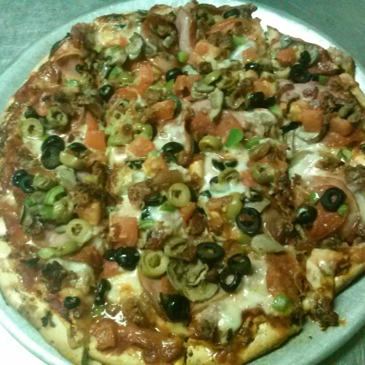 Pepperoni Tomato Black Olive Jalapeno Extra Cheese