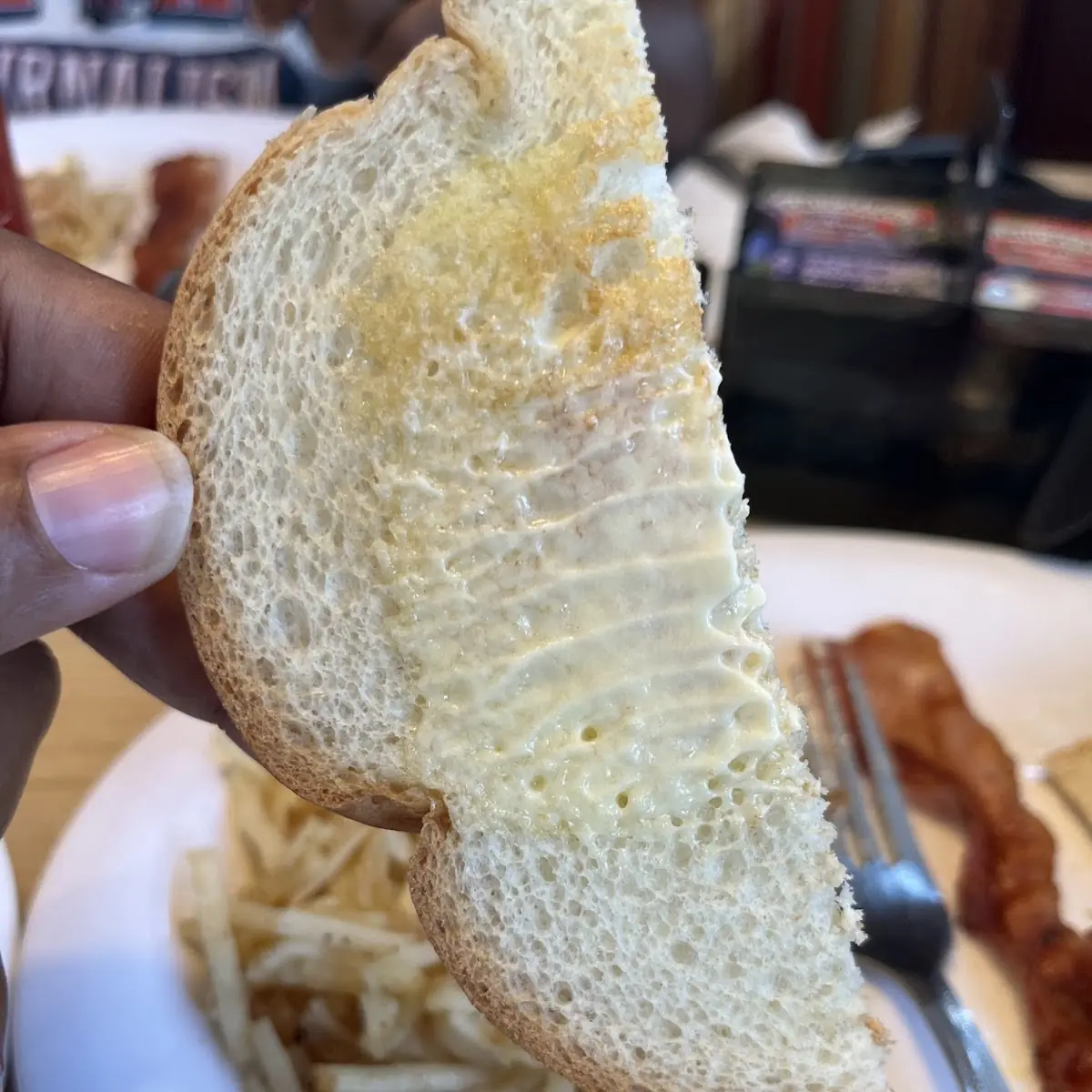 Toasted Bread That Was Supposed to Be Cooked on Grill and Was not and Butter Was Added to Cold Bread