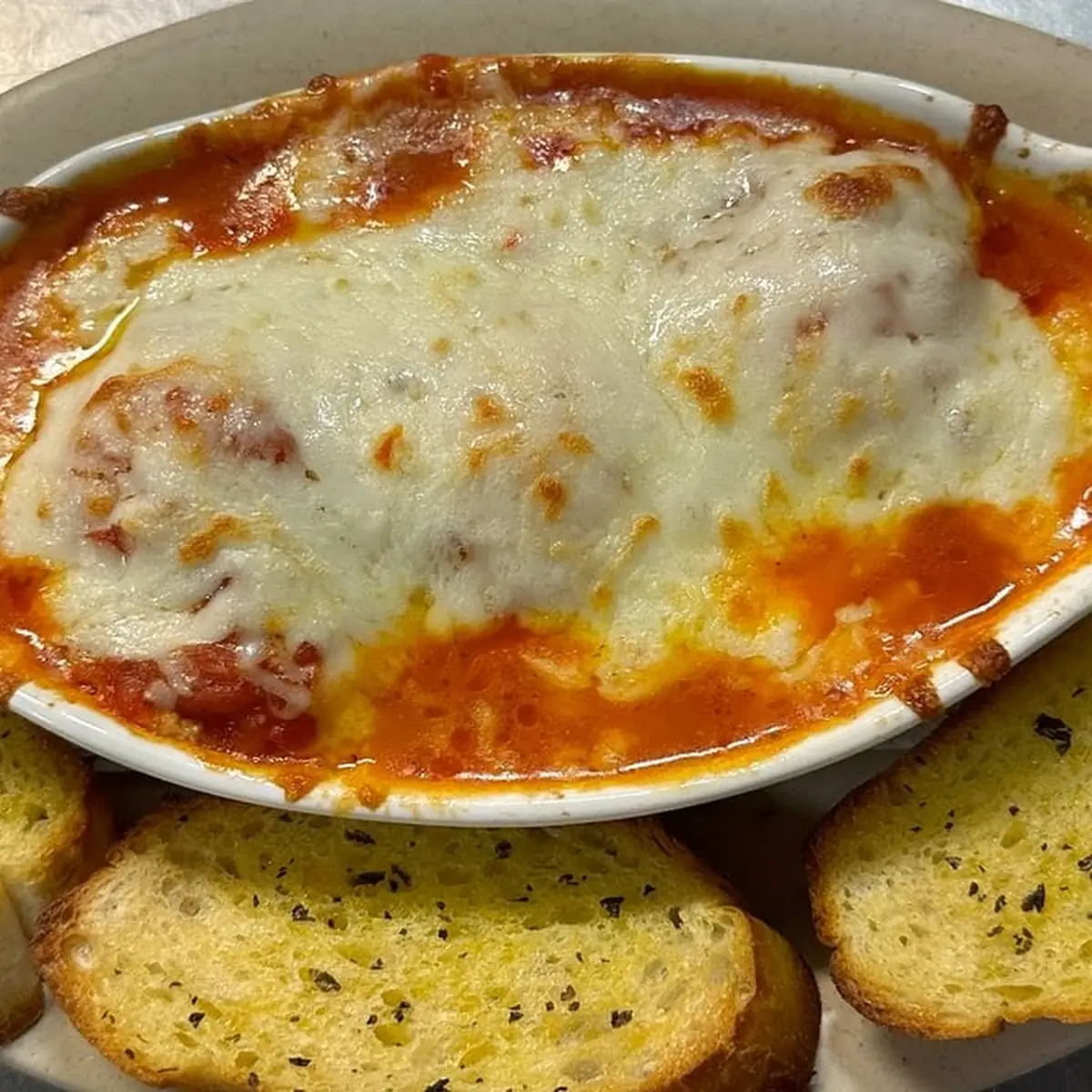 2 Spaghetti or 2 Lasagna with Garlic Bread