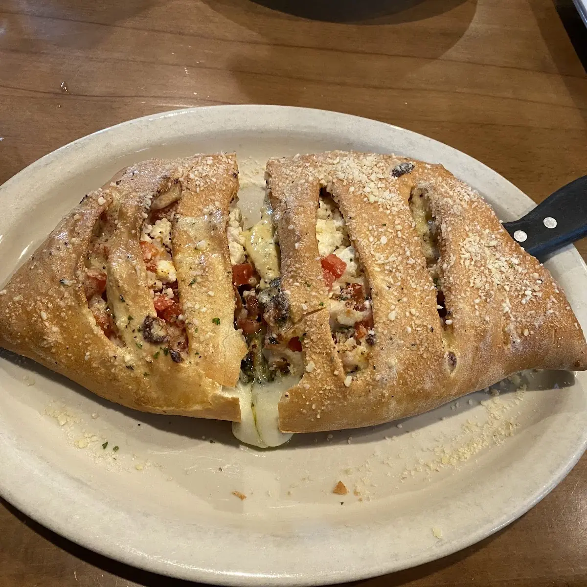 Ultimate Stromboli with Cheese & Sauce Add Topping 1 19 Each Premium 1 69 Each