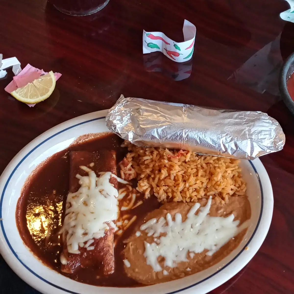 Chicken Enchilada a Beef Tamale Rice and Beans