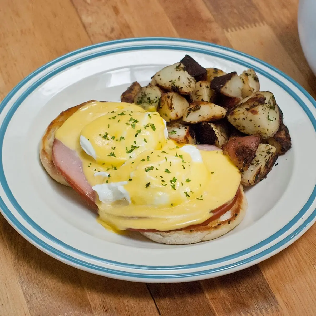 Eggs Benedict with Sausage and Potatoes