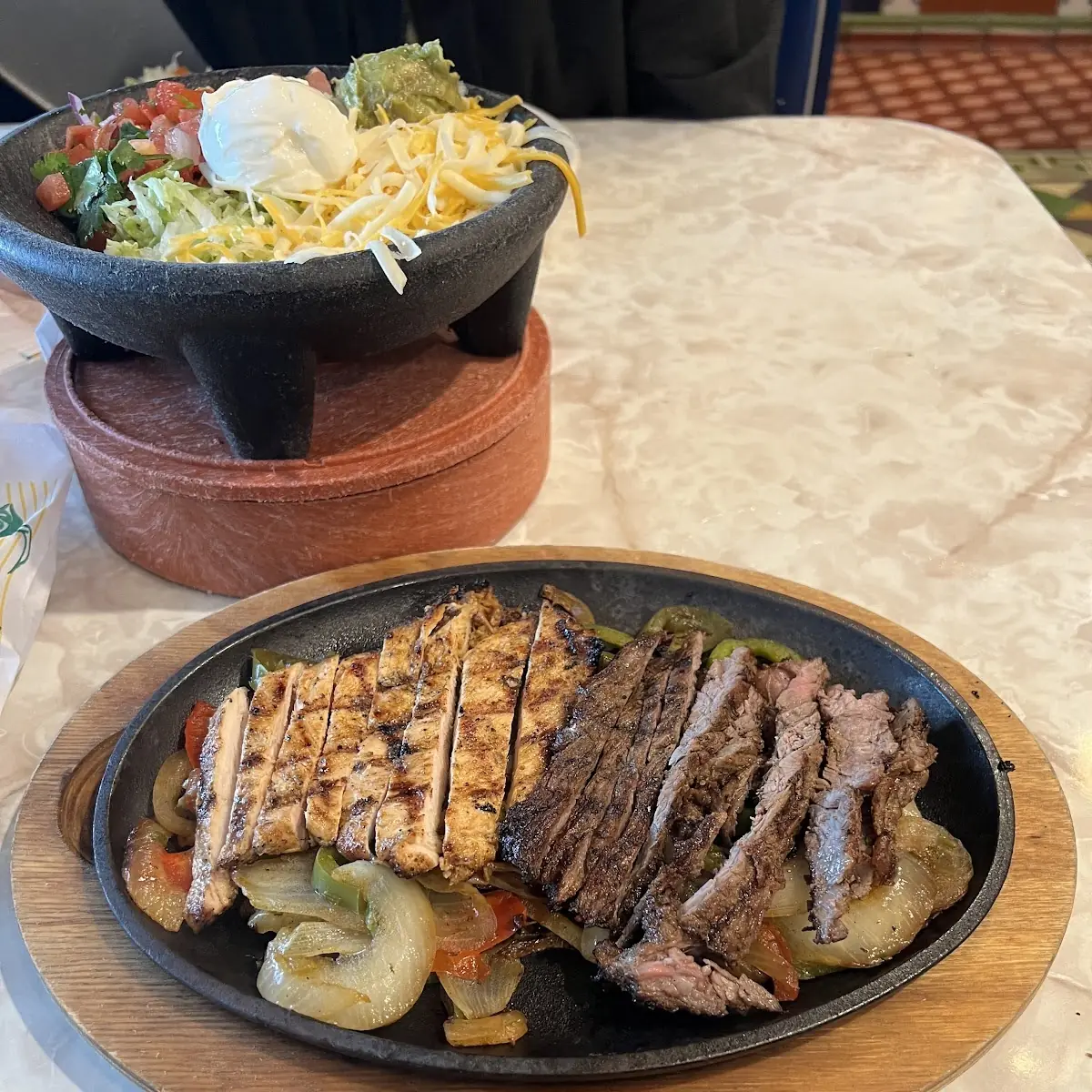 Steak Chicken and Shrimp Fajitas