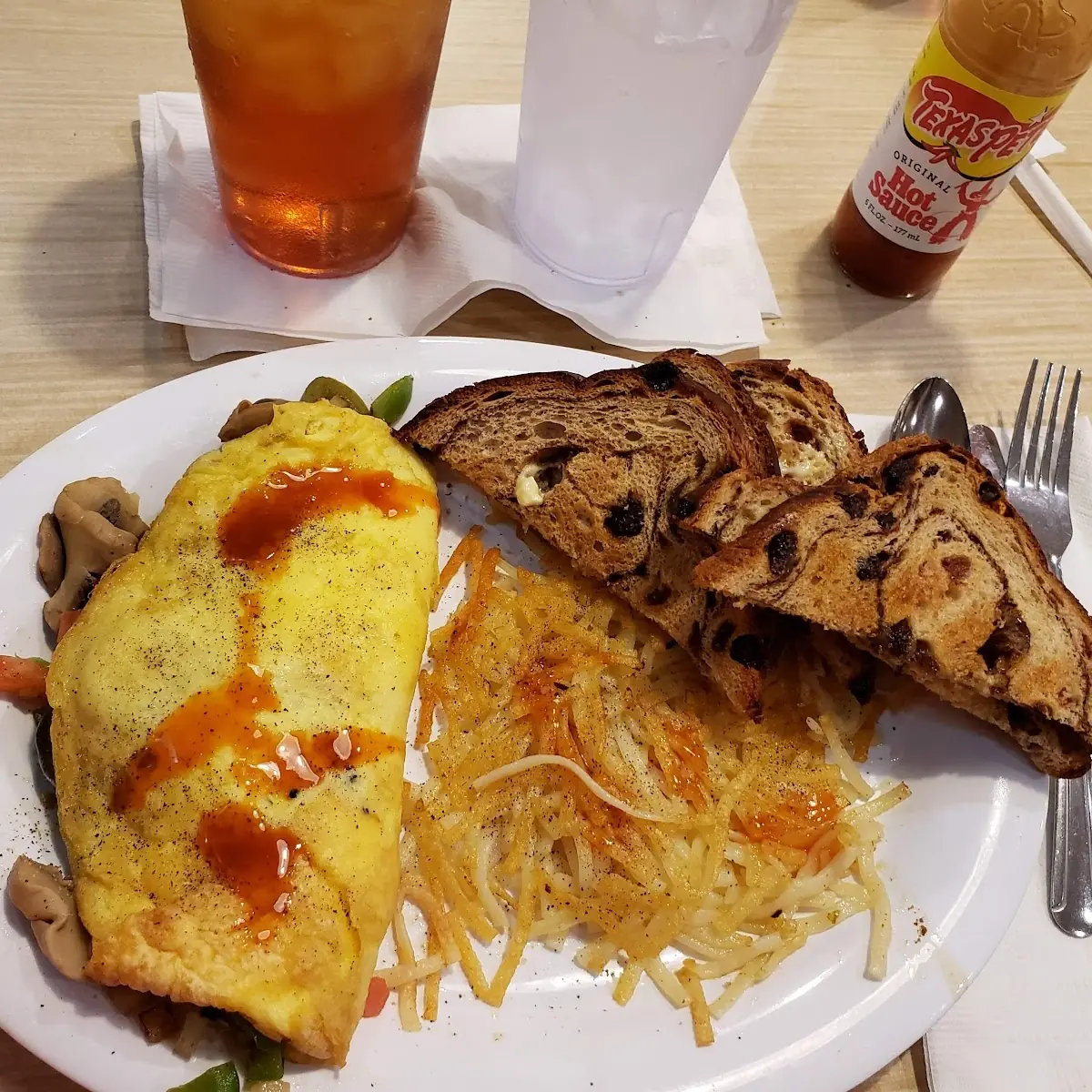Garden Omelet with Raisin Bread and Hash Browns