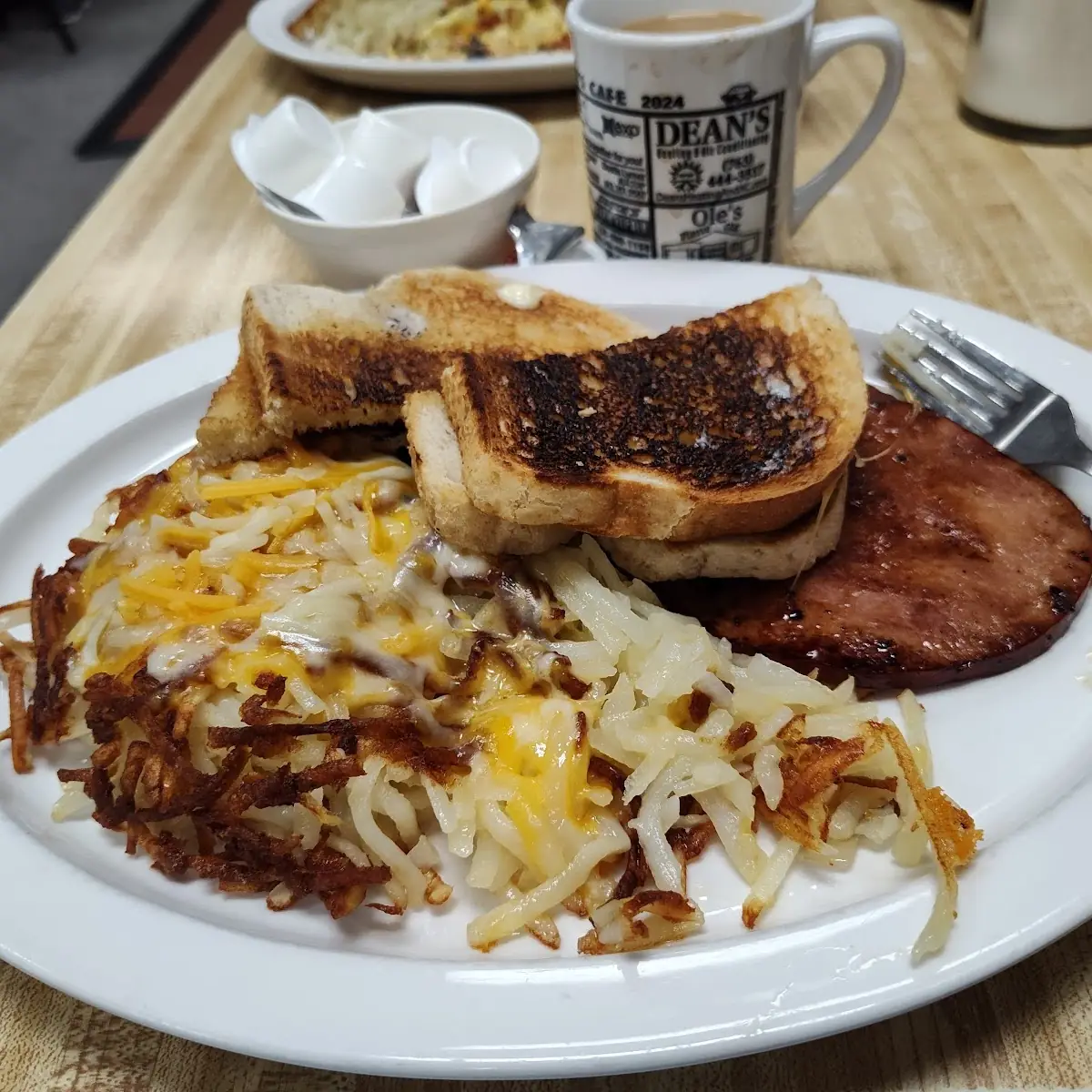 Corned Beef Hash Eggs Hash Browns and Toast