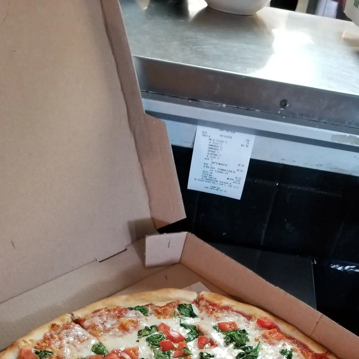 Pizza with Fresh Tomatoes and Spinach