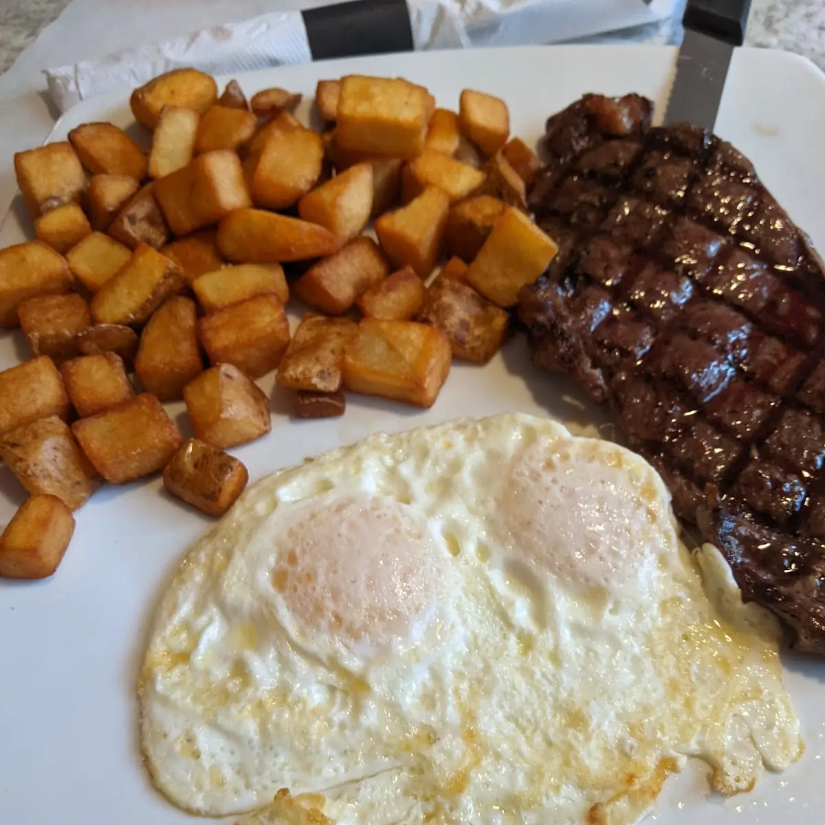 New York Steak and Eggs & Potato