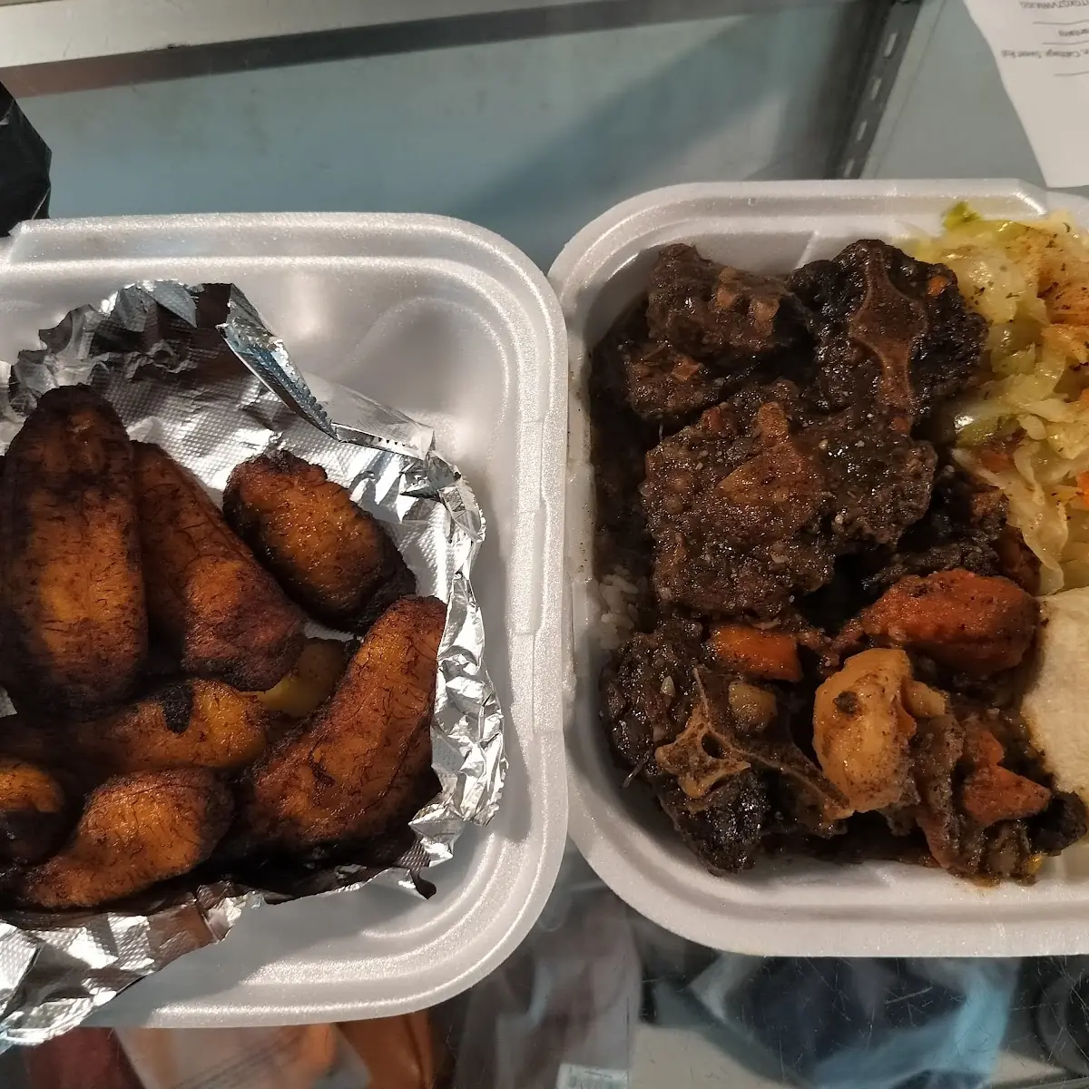 Oxtails White Rice Cabbage and Plantains