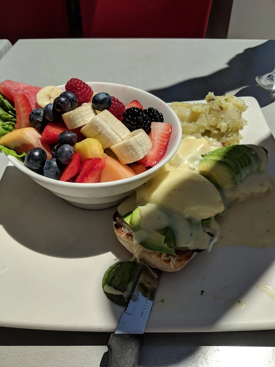Avocado Eggs Benedict with Fruit Bowl