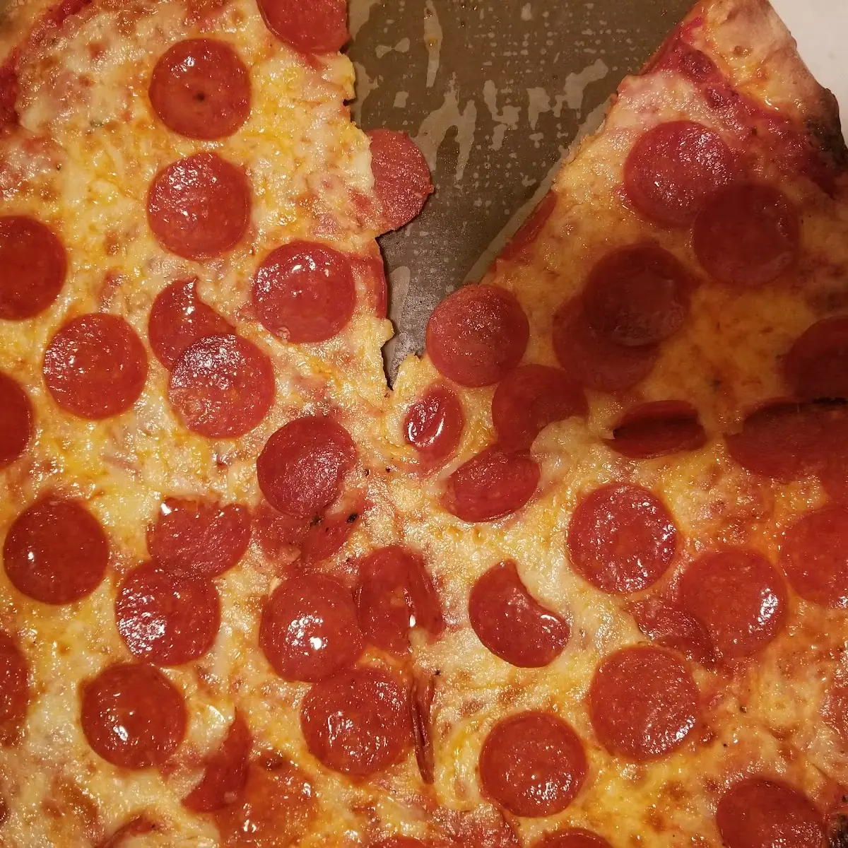 Extra Cheese and Pepperoni Pizza