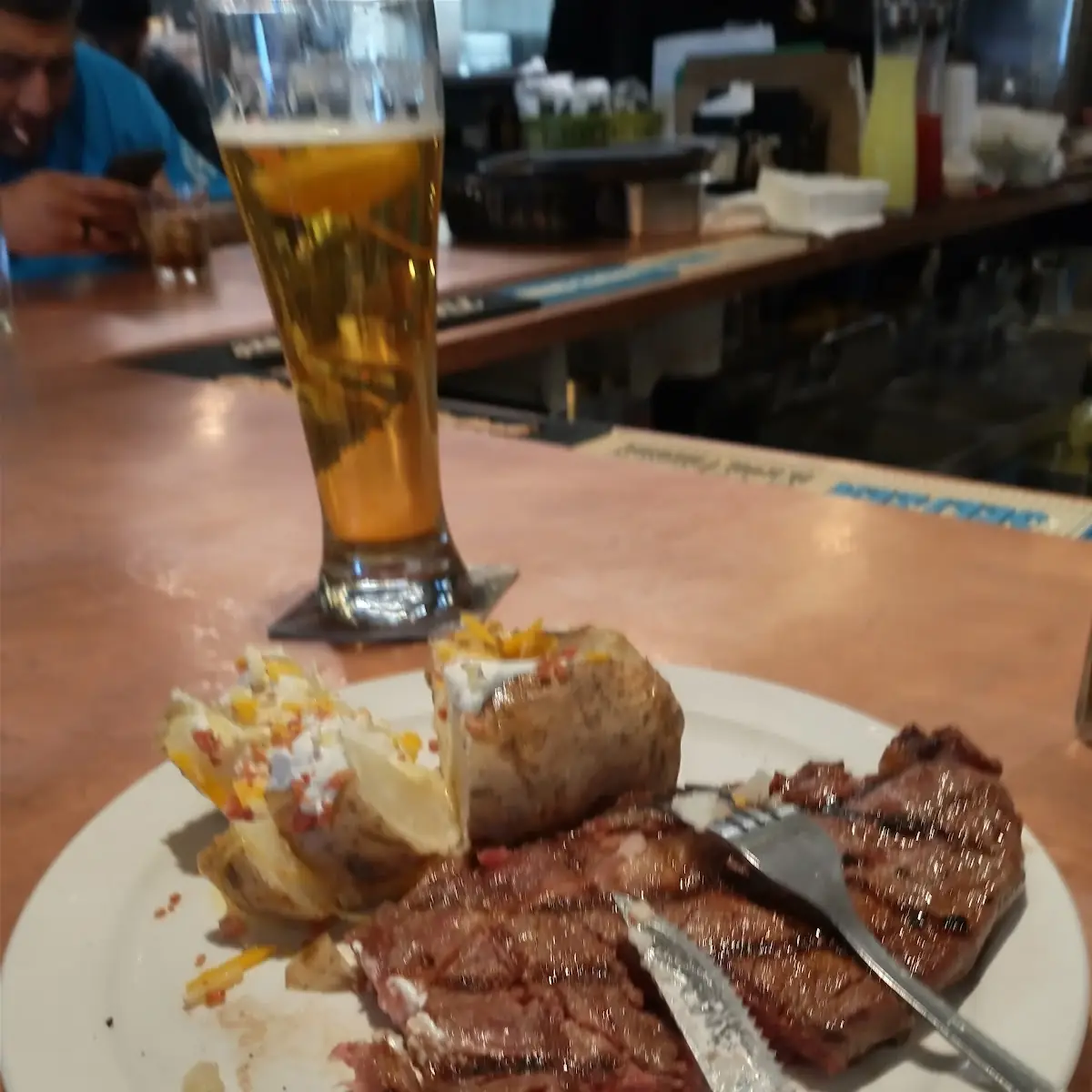 Ribeye Medium Rare and Loaded Baked Potato