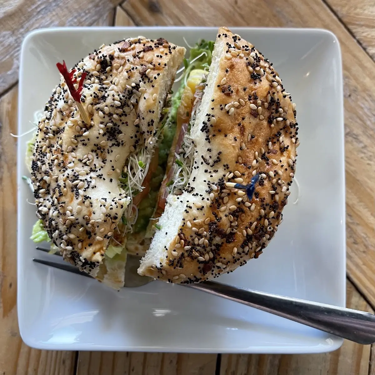 Avocado and Egg on a Poppyseed Bagel