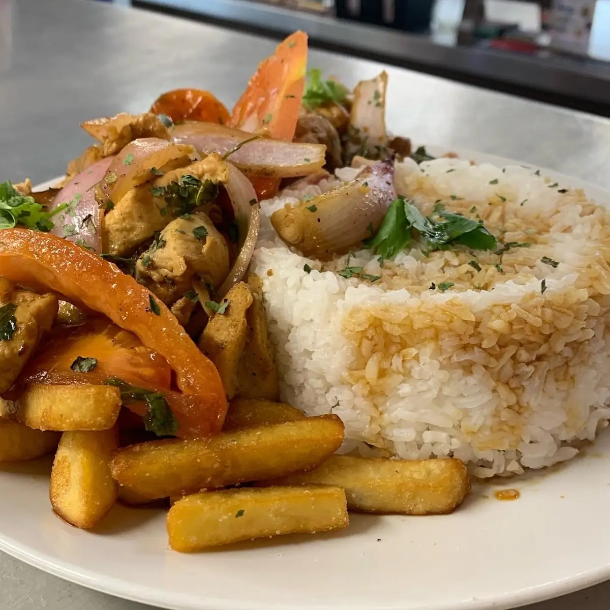 Lomo Or Pollo Saltado