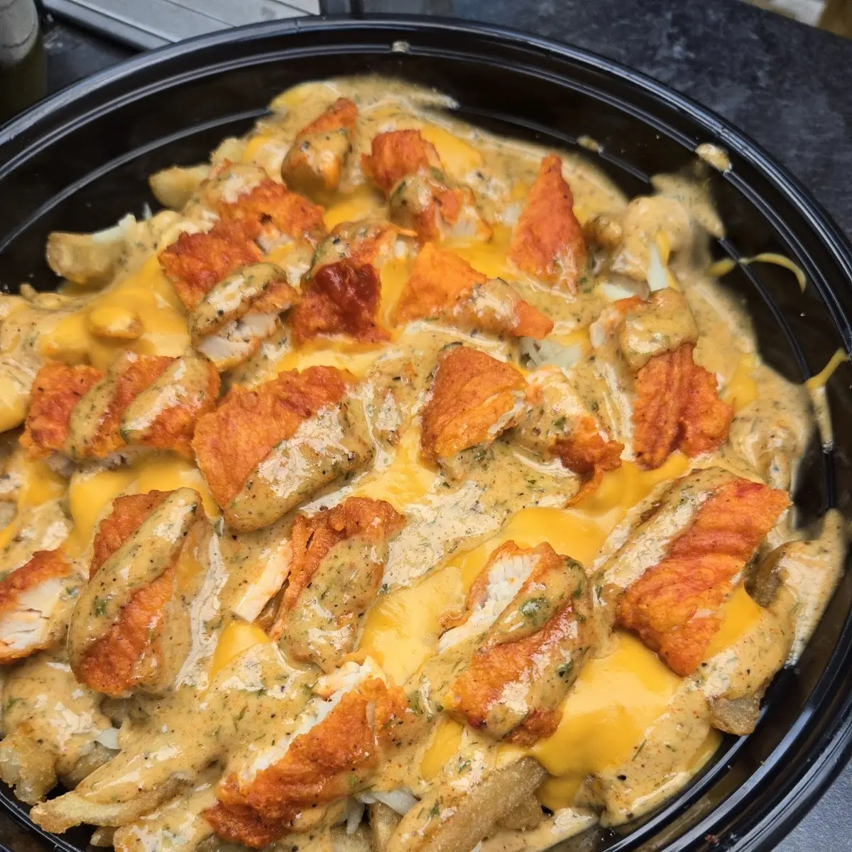 Buffalo Chicken Cajuin Fries
