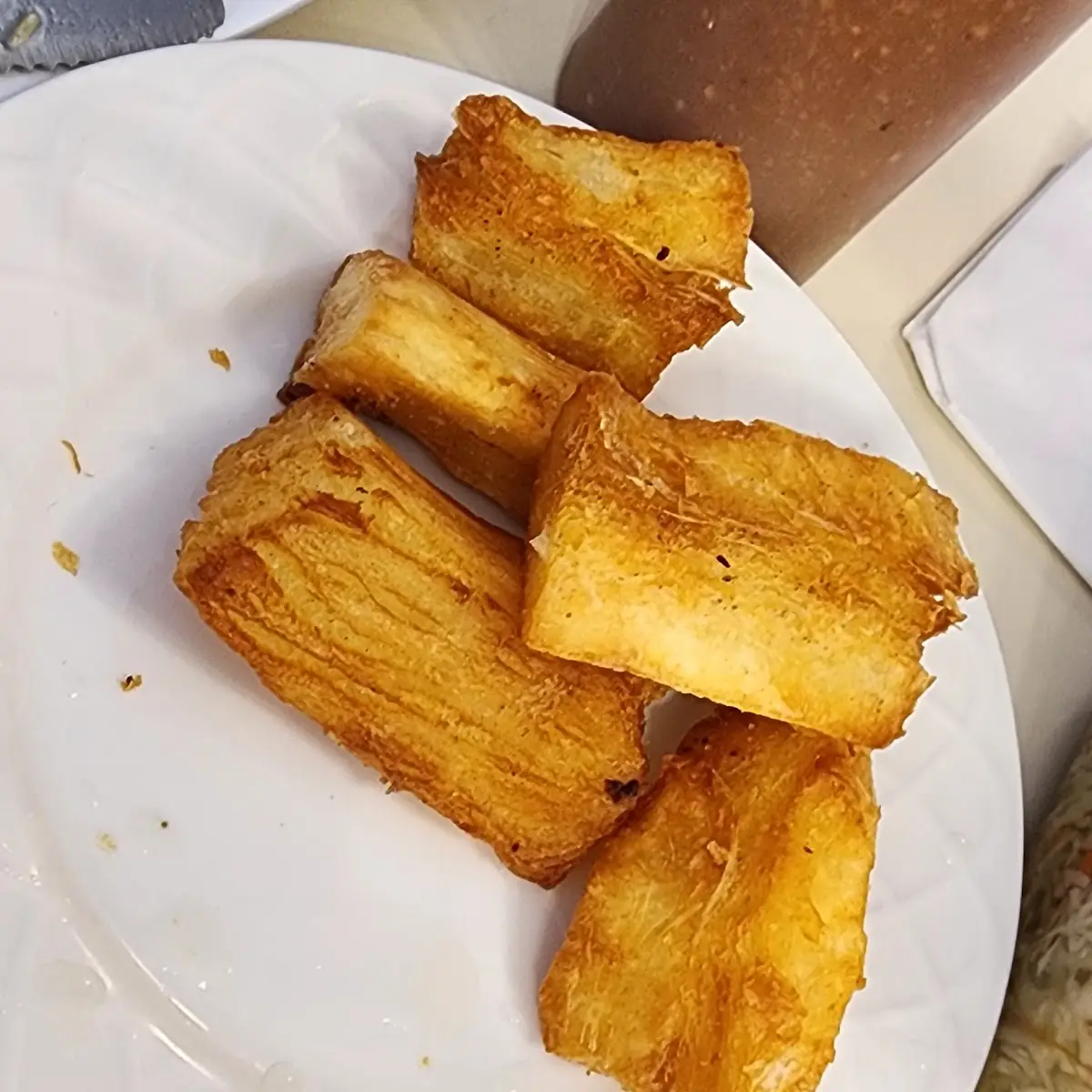 Fried Corn Tamal with Sour Cream