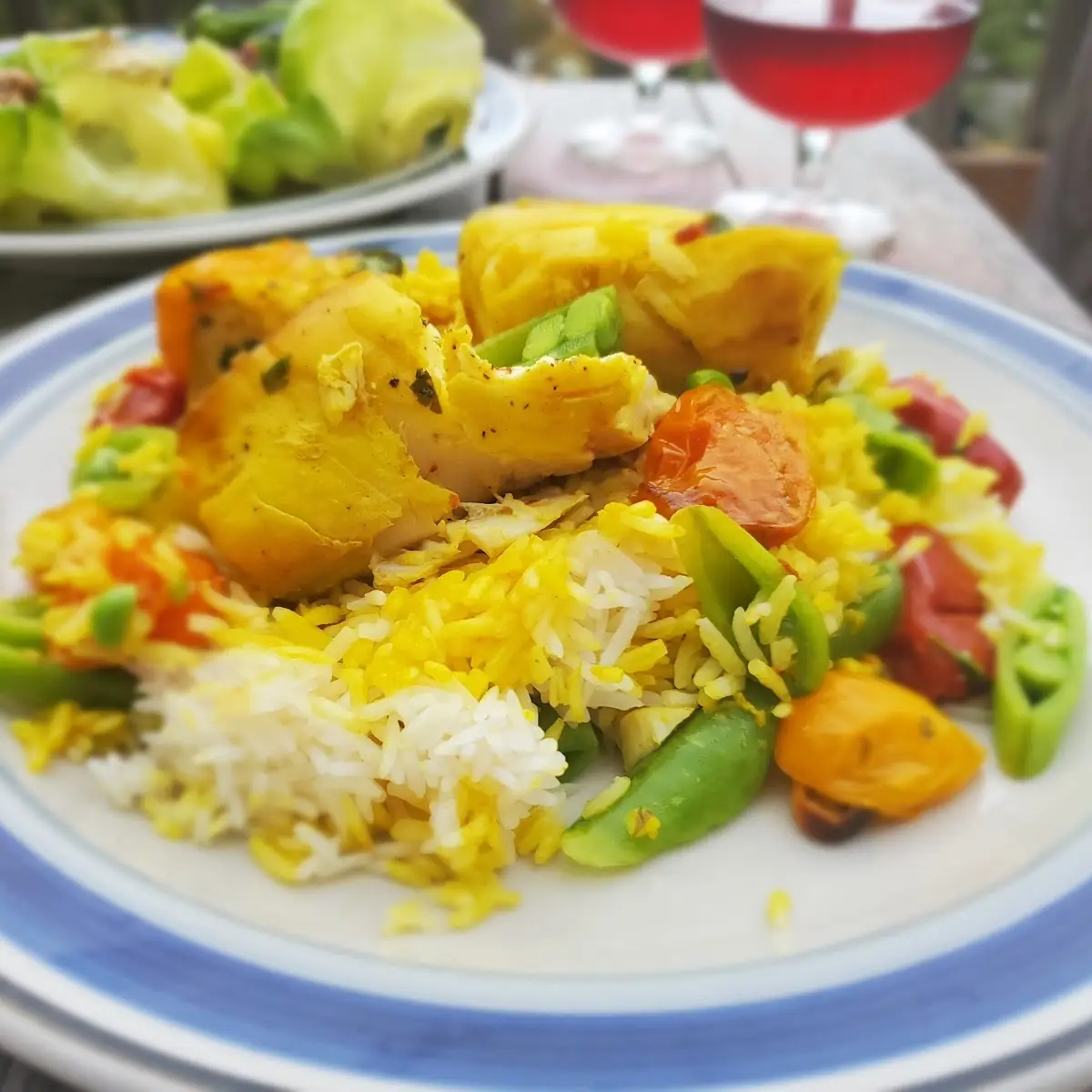 Halibut over Rice with Heirloom Tomatoes and Snap Peas