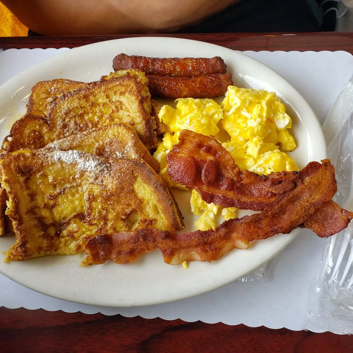 French Toast Bacon Scrambled Eggs Sausage from Cafe Centinela