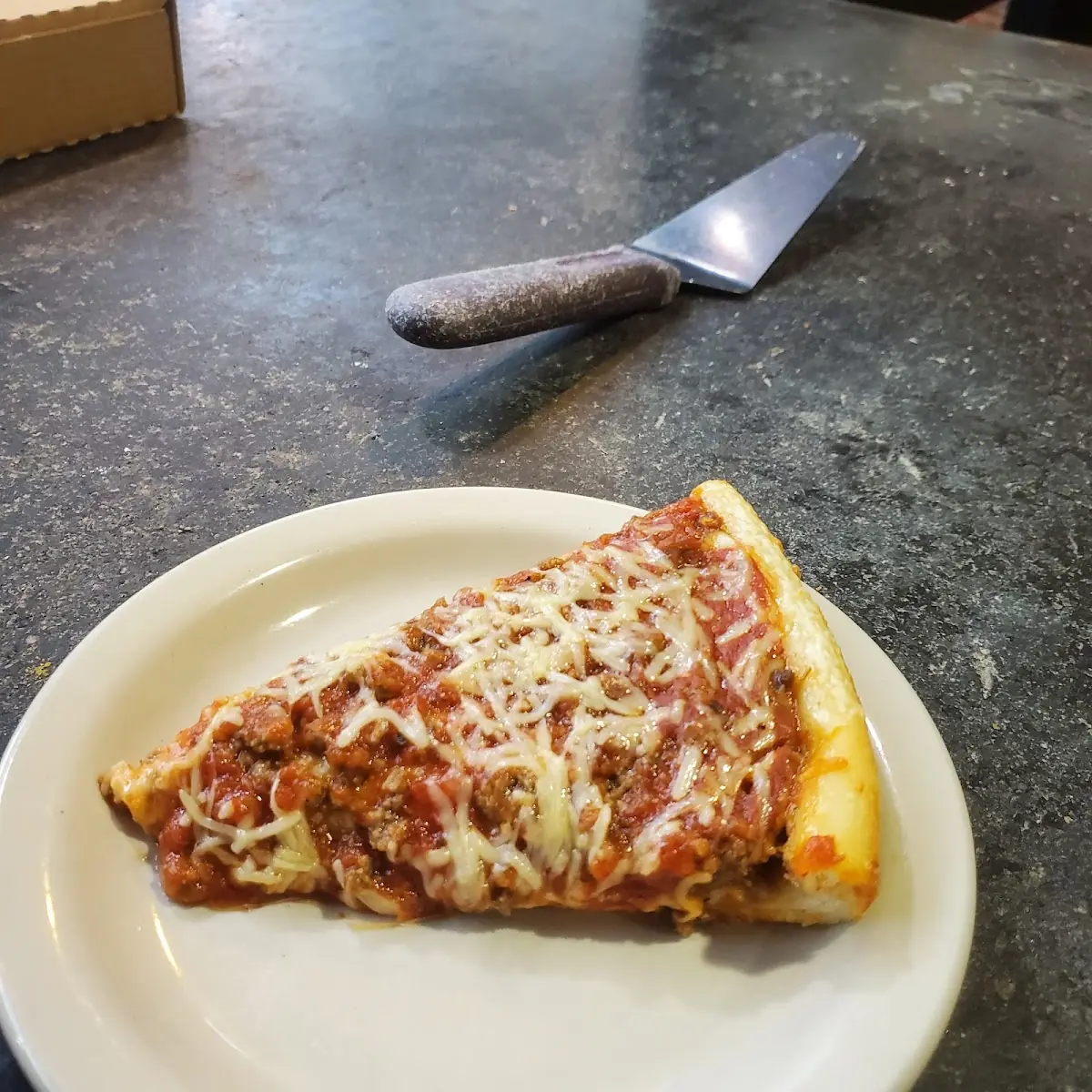 Slice of Chicago Style Pizza