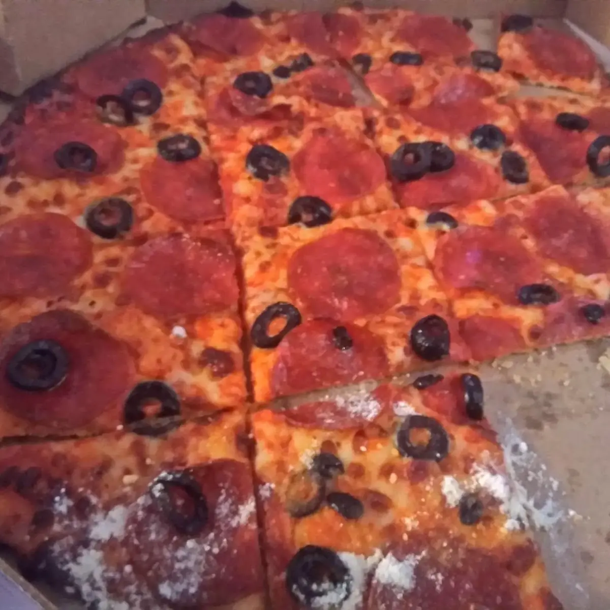 Thin Crust Pepperoni and Olive Pizza