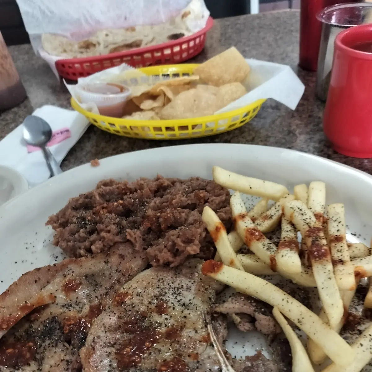 Pork Chops French Fries and Refried Beans