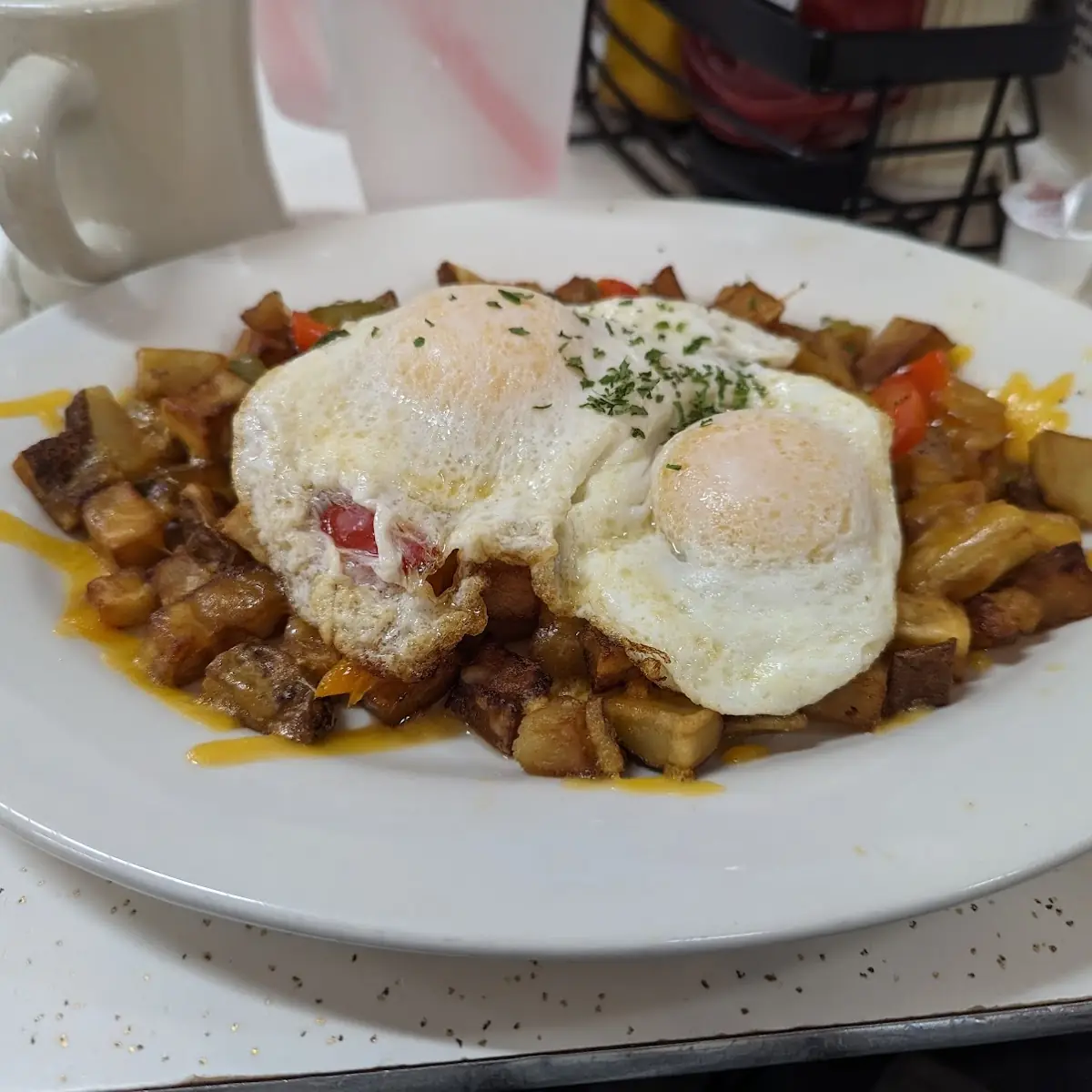 Loaded Hash Brown Skillet with Eggs over Easy