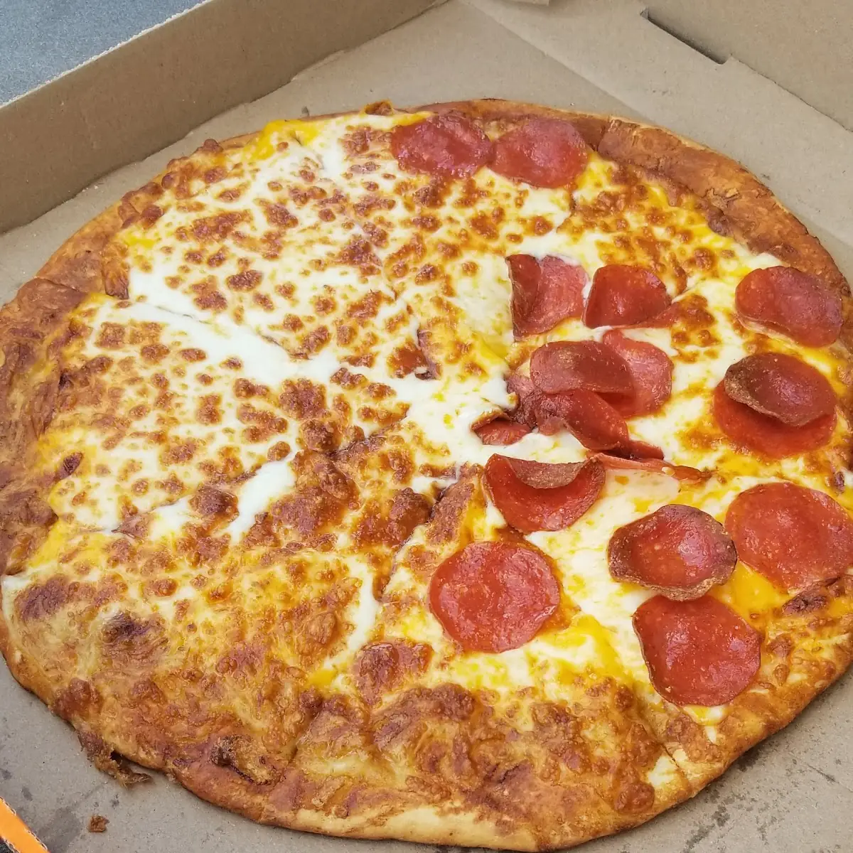 Half Cheese Pizza Half Pepperoni Pizza