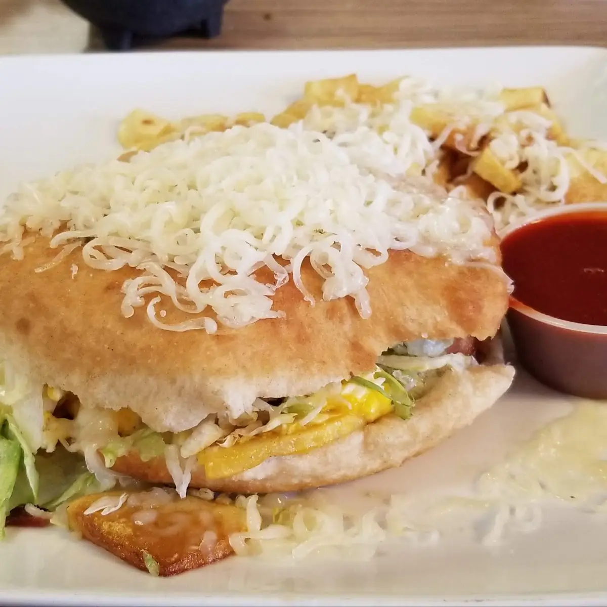 Breakfast Stuffed Sopapilla--Eggs Bacon Beans Potatoes and Cheese