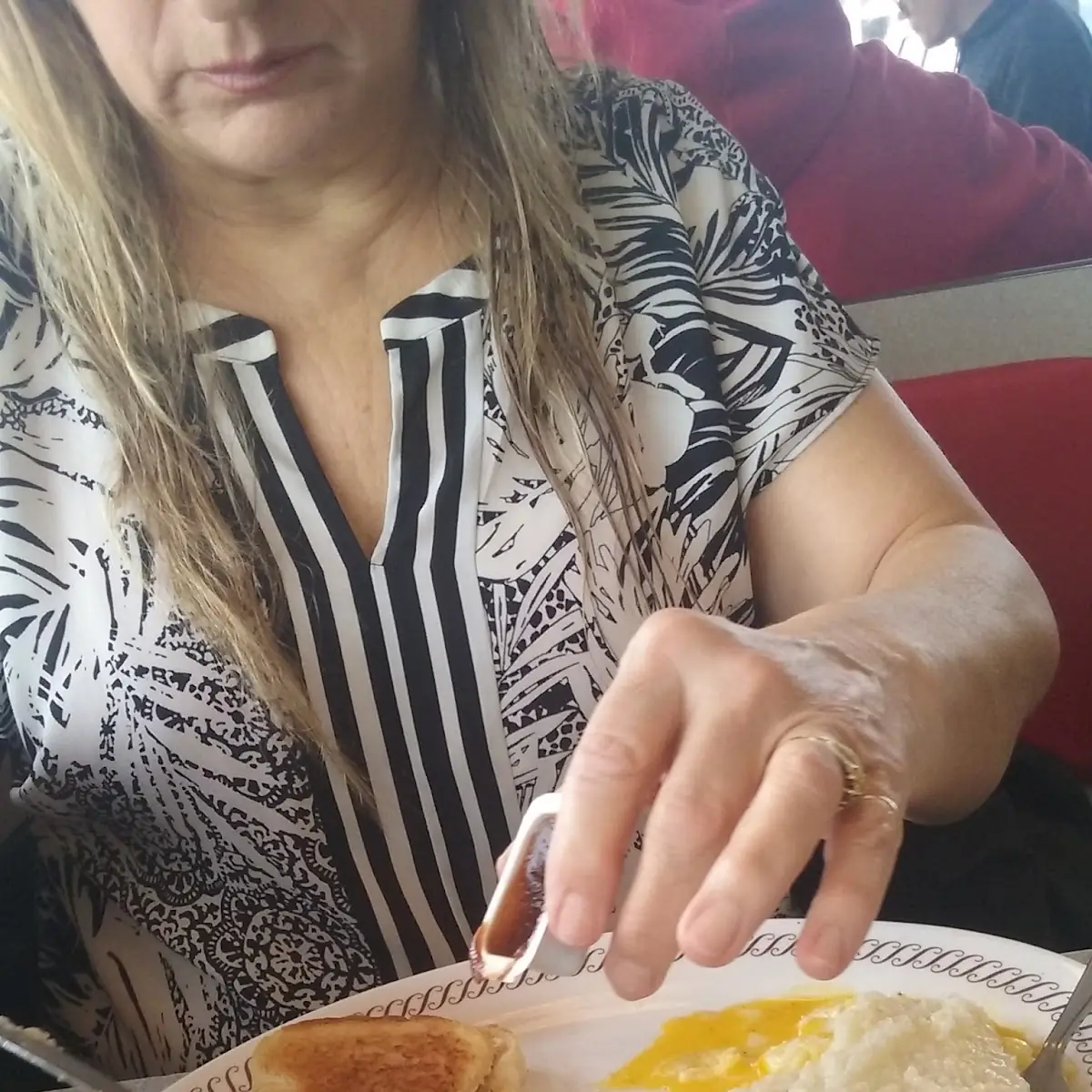 Two Eggs over Easy Bacon & Toast with Grits