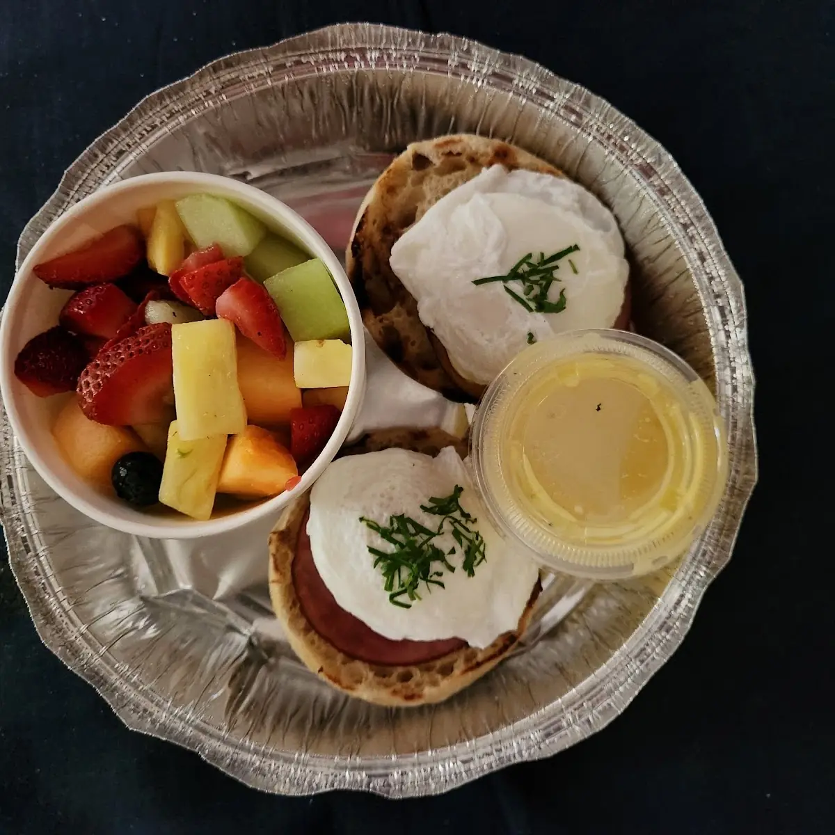 Eggs Benedict with Fresh Fruit Sub on the Side