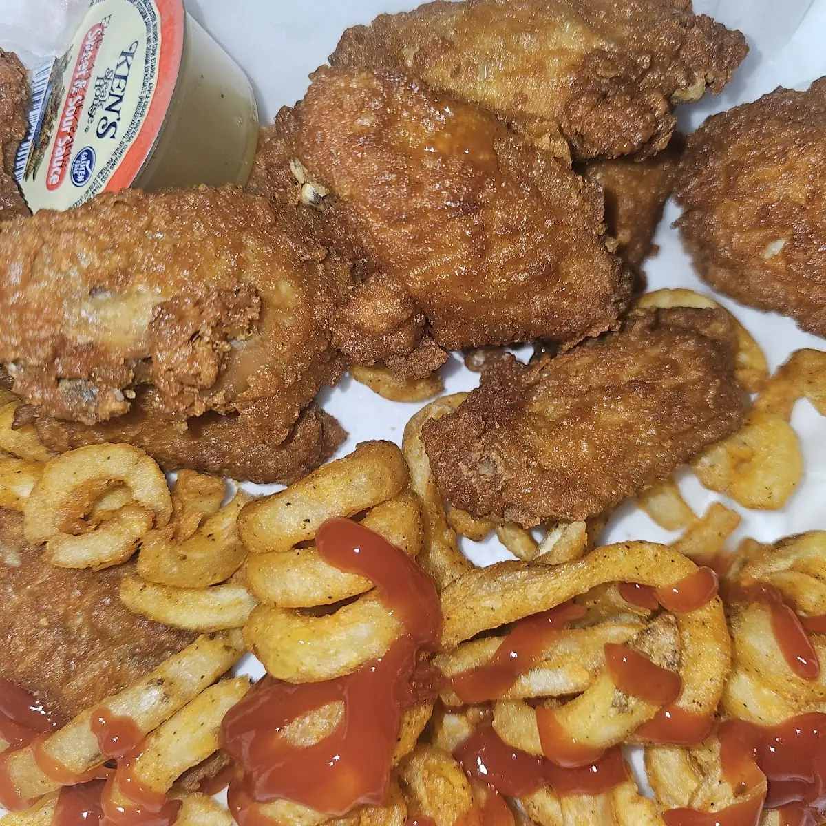 Chicken Wings and Curly Fries