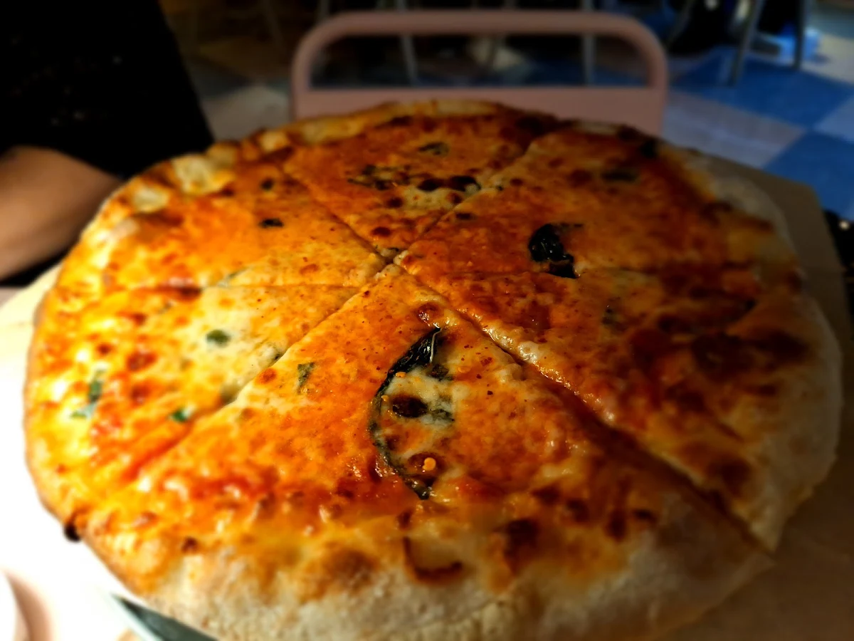 Tomato Mozzarella and Basil Pizza