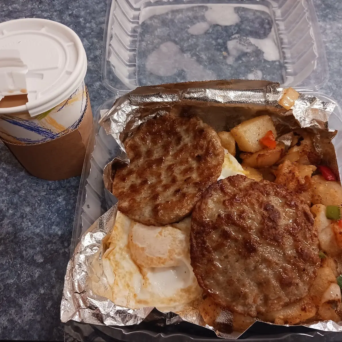 2 Eggs over Easy w Home Fries Toast Sausage