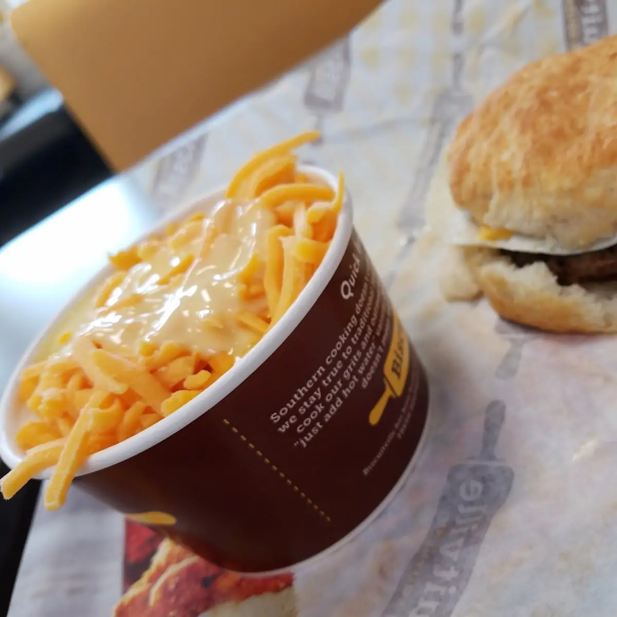 Cheddar Cheese Grits and Sausage Egg and Cheese Biscuit