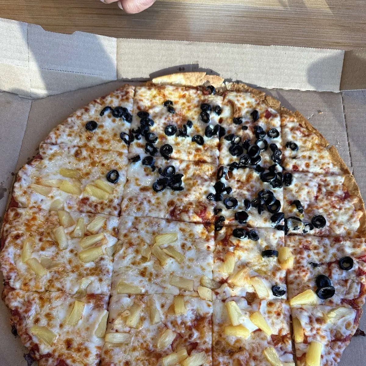 Thin Crust Half Black Olive Half Pineapple Pizza