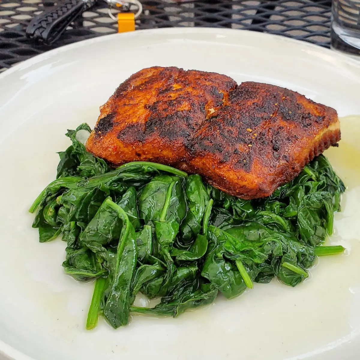 Blackened Salmon Herb Risotto Garlic Sautéed Spinach Infused Tomato Oil
