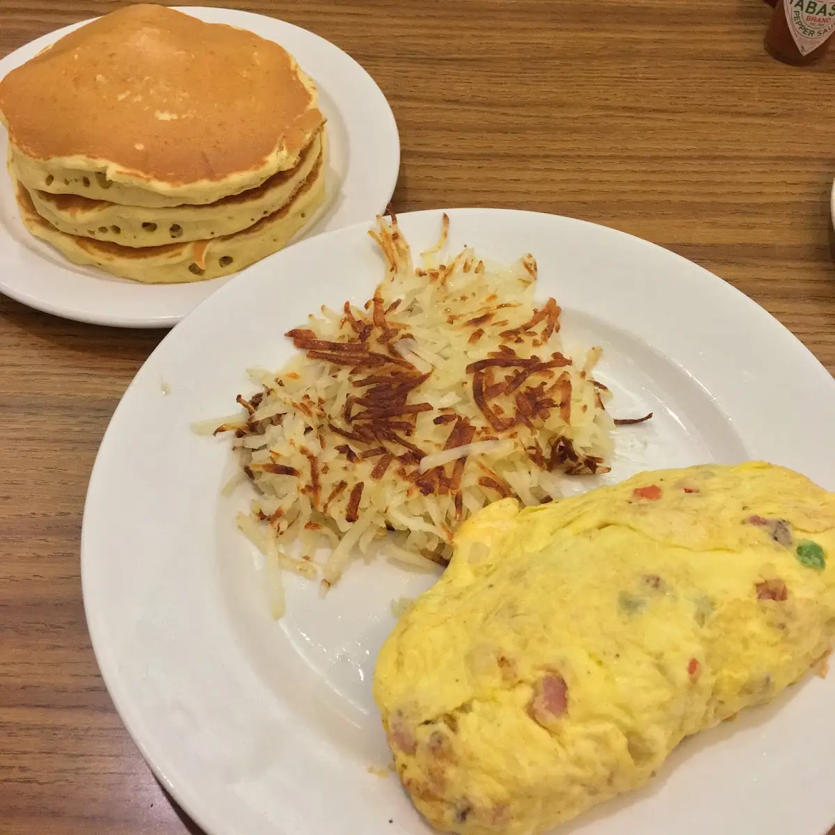 Western Omelette Hash Browns and a Stack of Pancakes