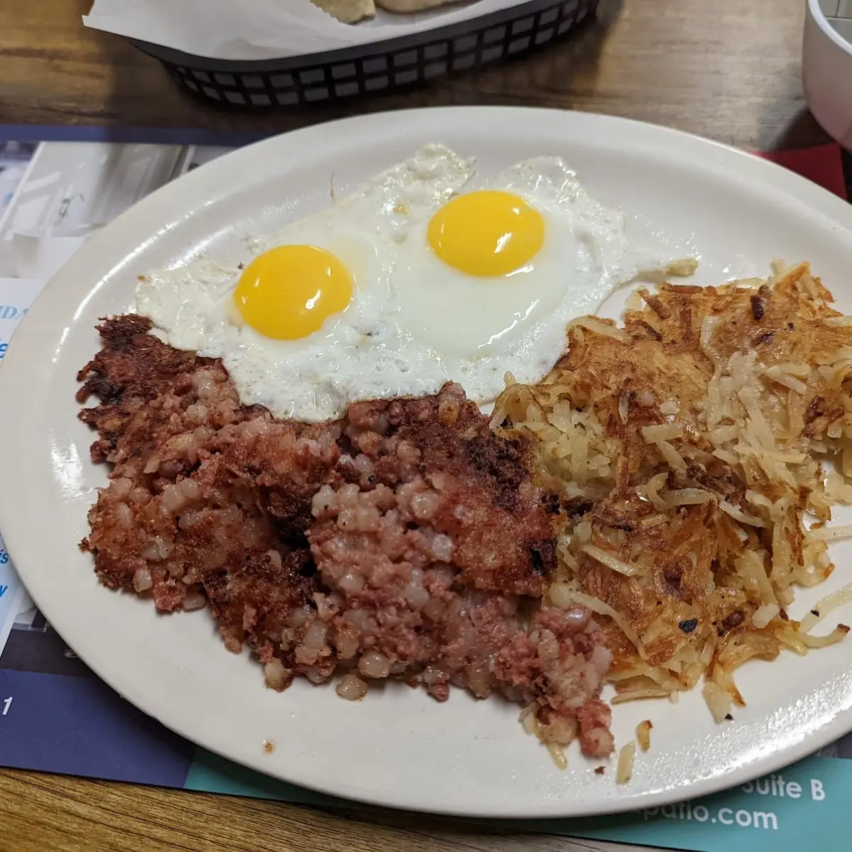Com Beef Hash Served with 2 Eggs Home Fries or Grits Toast English Muffin Bagel or Biscuit