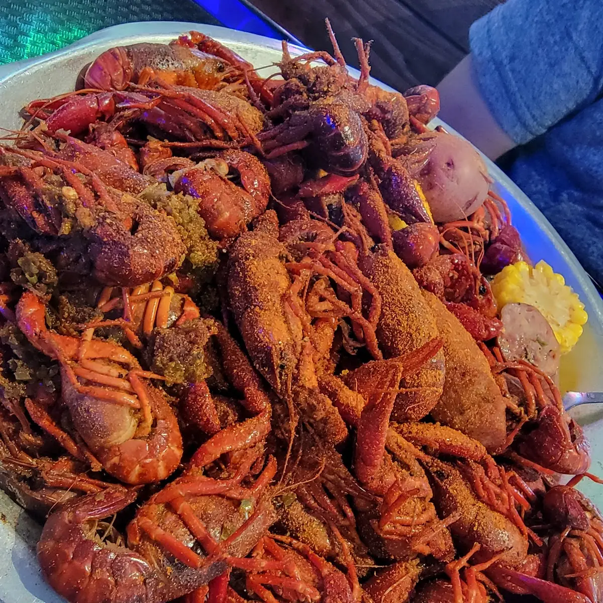 Boiled Crawfish Sausage Potatoes Corn and Chips