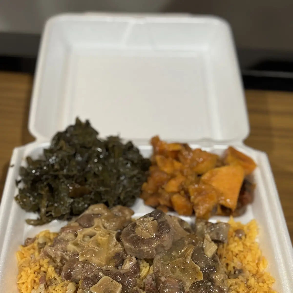 Oxtails Served with White Rice or Rice & Beans Plus 2 Sides