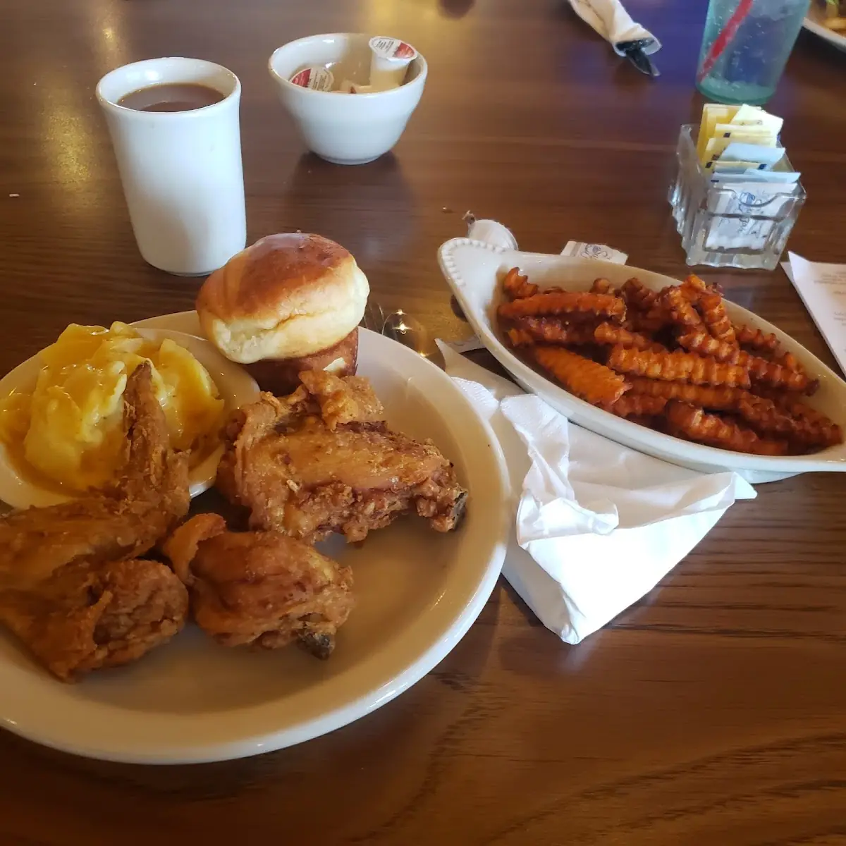 Fried Chicken Dinner with Sweet Potato Fries Mashed Potatoes and Gravy and Roll