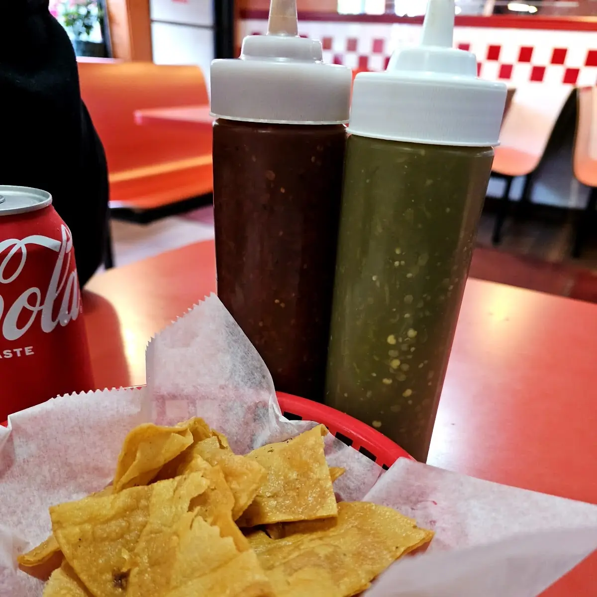 Tortilla Chips with Salsa Bottles