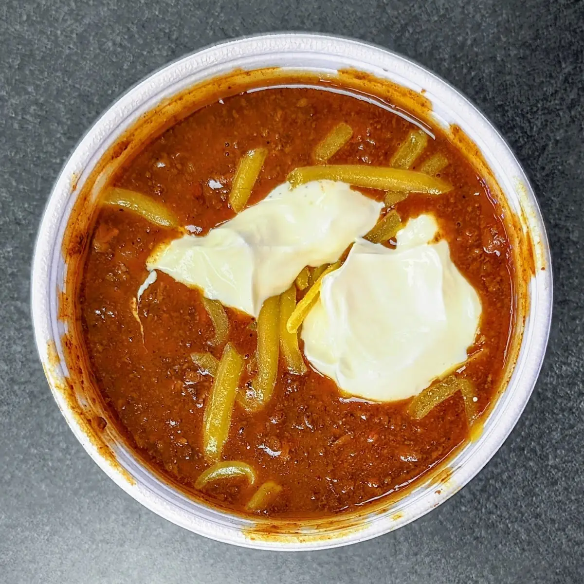 Chili with Sour Cream and Cheese